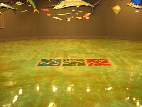 Stained concrete with custom design inlays